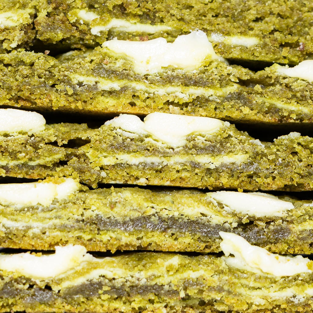 Cross section of matcha cookies showing white chocolate chips 